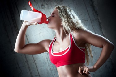 Girl Drinking Protein Shake After Workout